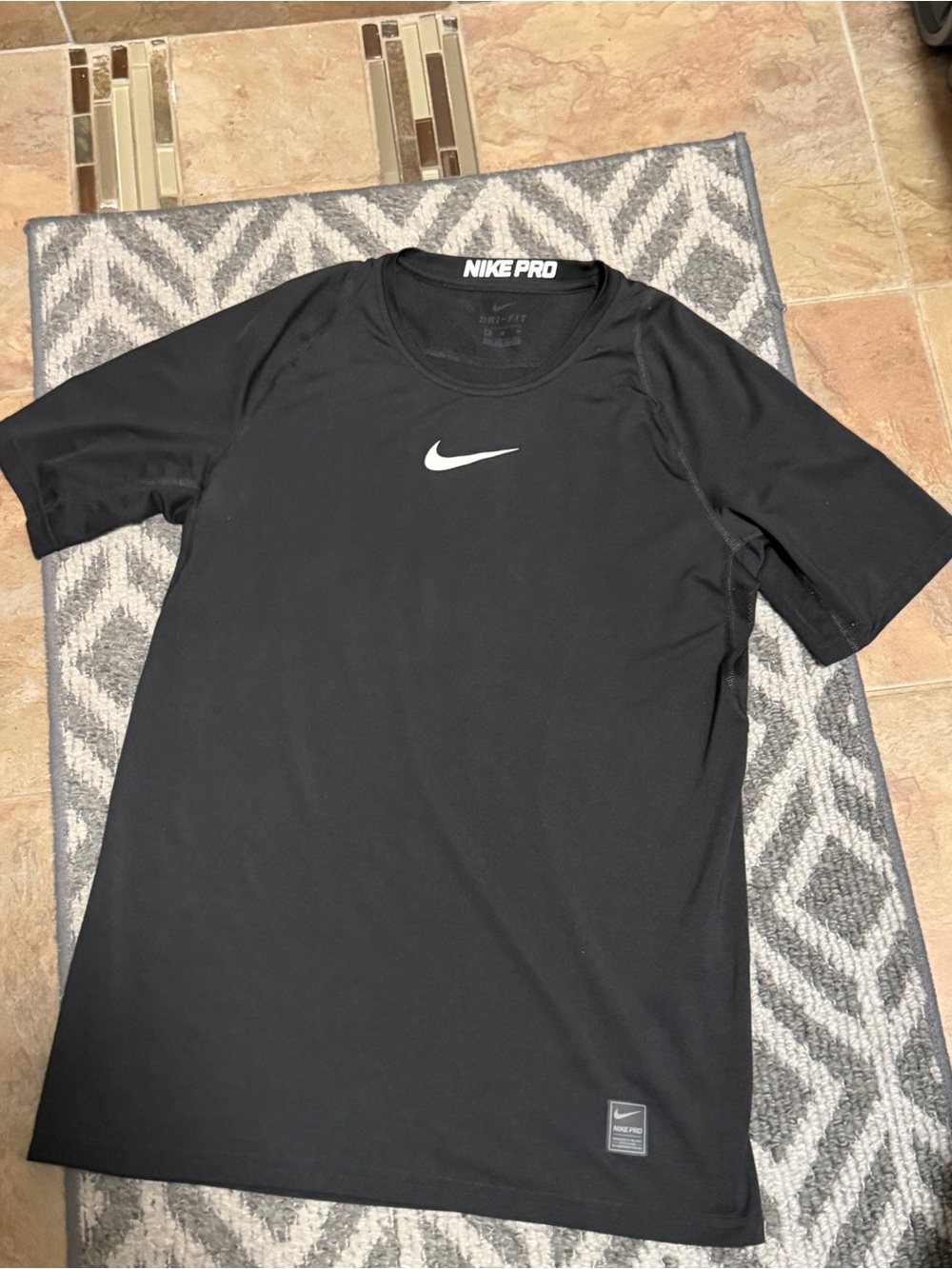Nike Black Short Sleeve Dri-FIT Performance Top with White Swoosh Medium